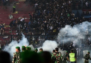 two released, one policeman arrested for indonesia stadium crush