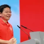 can singapore outbid for investment lawrence wong at may day rally
