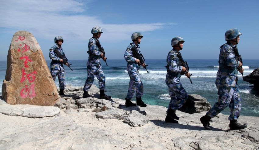 south china sea beijing’s dangerous game of possession and militarization