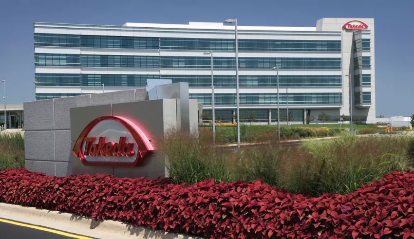 takeda pharmaceutical plans to buy 1.8% issued shares and revised the full year operational profit